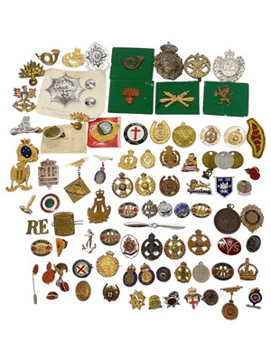 Lot 826 - Group of assorted British military cap badges, sweetheart brooches and other badges.
