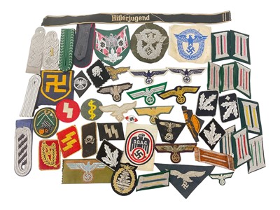 Lot 827 - Group of assorted cloth Nazi German uniform badges.
