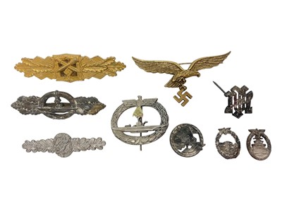 Lot 837 - Group of nine Nazi German clasp badges.