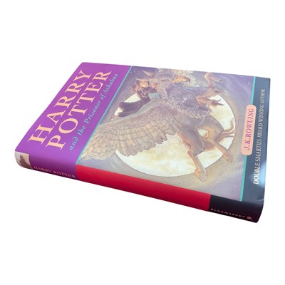Lot 1389 - J K Rowling - Harry Potter and the Prisoner of Azkaban, rare binding anomaly where the print block is inserted upside down and back to front, 1999 first edition, 3rd print run, hardback with dus...