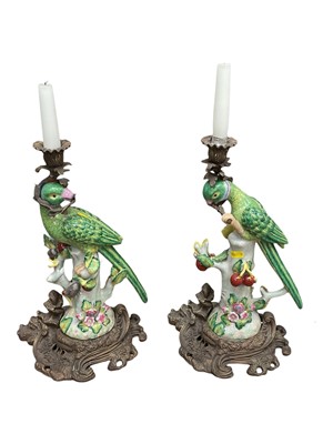 Lot 10 - Pair of 19th century style gilt metal mounted parrot candlesticks