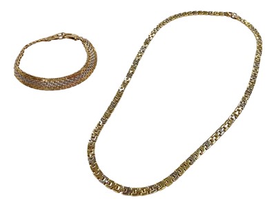 Lot 1015 - Yellow and white metal bracelet and necklace, stamped ‘585’indicating 14ct gold
