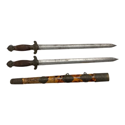 Lot 857 - Late 19th century Chinese Jian sword with engraved brass mounts, ribbed wood grip, straight double-edged blade in blond tortoiseshell veneered and engraved brass mounted scabbard, blade 42.5cm o...