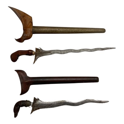 Lot 859 - Indonesian Kris with Damascus steel blade in brass mounted scabbard, together with another Kris, (2).