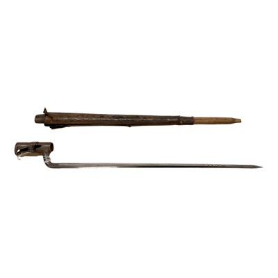 Lot 860 - Victorian Martini Henry socket bayonet in leather covered scabbard.