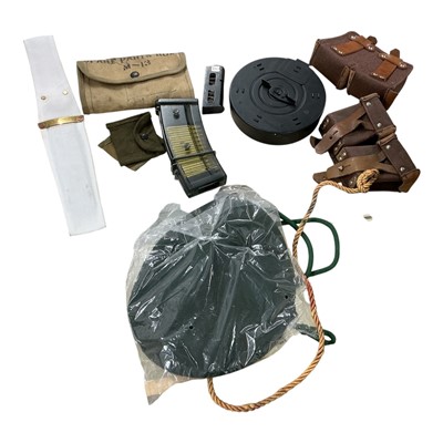 Lot 881 - Two boxes of assorted Militaria to include sheaths, bullet casings and other items, (2 boxes).