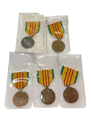 Lot 907 - Group of five United States Vietnam Service medals, (5).