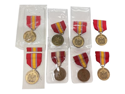 Lot 914 - Group of eight United States National Defense Service medals, (8).