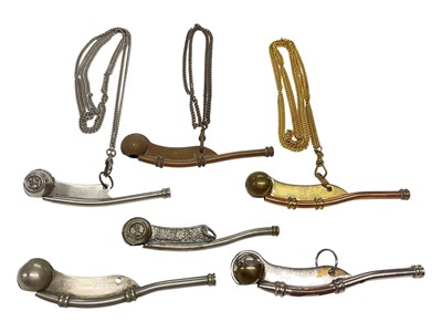 Lot 918 - Group of six Bosuns' whistles, including one with broad arrow mark, (6).