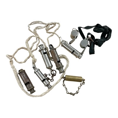 Lot 919 - Second World War A.R.P. whistle, together with a group of other whistles, (8).