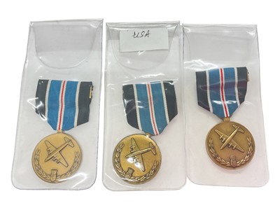 Lot 933 - Group of three United States Medal for Humane Action medals, (3).