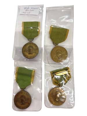 Lot 940 - Group of four United States Women's Army Corps (WAC) service medals, (4).