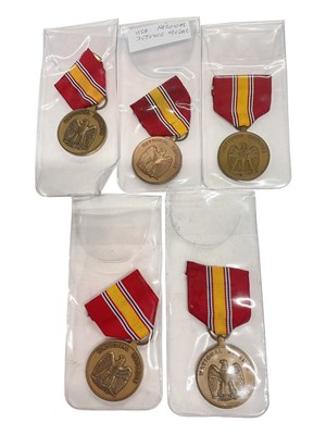 Lot 946 - Group of five United States National Defense medals, (5).