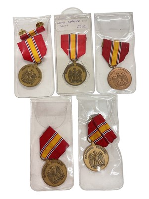Lot 947 - Group of five United States National Defense medals, (5).