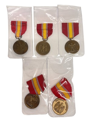 Lot 950 - Group of five United States National Defense medals, (5).