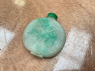 Lot 5067 - Chinese green jadeite snuff bottle with character marks in relief, 5.75cm high