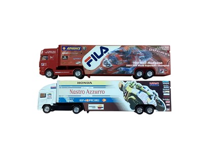 Lot Corgi 1:64 scale diecast articulated lorries inclding ERF Nastro Azzurro Honda racing team trailer, Man Harley Davison racing team trailer, DAF Fila Ducati racing team trailer & Volvo Kawasa...
