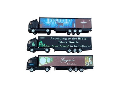 Lot Corgi 1:64 scale diecast articulated lorries including DAF J & B scotch whisky box trailer, Renault Cutty Shark scotch whisky Curtainside, Volvo Speyside Distillery box trailer, Volvo Black...