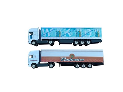 Lot Corgi 1:64 scale diecast articulated lorries including DAF Budweiser Curtainside, DAF WKD Curtainside, Volvo Boddingtons Bitter box trailer, Volvo Guinness box trailer, Volvo Strogbowbox trailer...