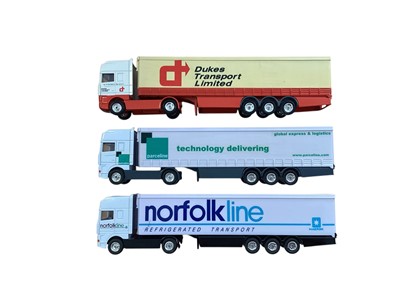 Lot Corgi 1:64 scale diecast articulated lorries including Renault Interlink Express curtainside, Renault RH curtainside, DAF Online curtainside, DAF Dukes Transport curtainside, DAF Parceline curtai...