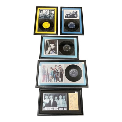 Lot 234 - Five Rolling Stones discs and ephemera including facsimile signatures, in black frames, (5)
