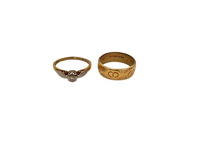Lot 905 - 18ct gold diamond single stone ring in illusion setting and 18ct gold wedding ring with engraved decoration (2)