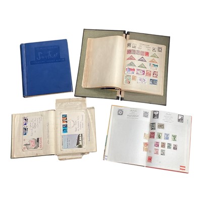 Lot 100 - Four albums of GB and world stamps