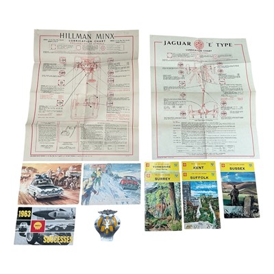 Lot 7 - Group of assorted automobilia to include Jaguar E Type and Hillman Minx lubrication charts, AA badge and Shell pamphlets, (1 box).