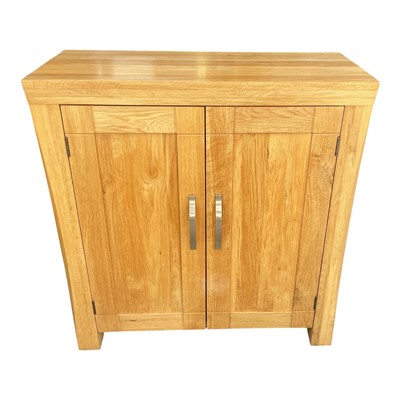 Lot 5330 - Contemporary light oak cupboard, enclosed by two panelled doors, the fitted interior with pigeon holes, ideal for bottles of wine! 83.5 x 91.5 x 35cm.