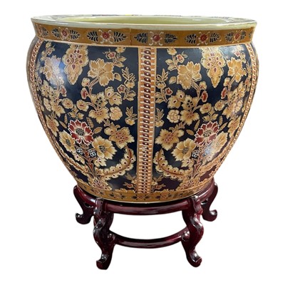 Lot 5157 - Chinese ceramic fish bowl on wooden stand, 37cm diameter