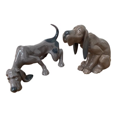 Lot 5057 - Two Lladro porcelain figures of bloodhounds