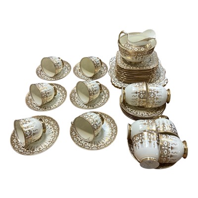 Lot 5012 - 12 person Tuscan porcelain teaset with gilded decoration and 12 matching square tea plates, circa 1930s