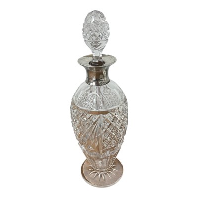 Lot 5051 - Silver collared cut glass decanter (Sheffield 1928), 31cm high
