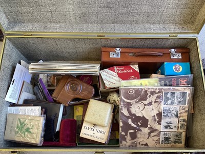 Lot 5176 - Sundry items in a trunk, including boxed Parker pens, musical lighters, Disney collectables