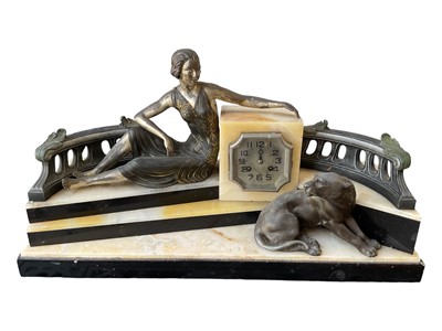 Lot 5190 - Large and impressive Art Deco spelter and marble clock, decorated with a seated woman and panther, measuring 64cm wide x 35cm high