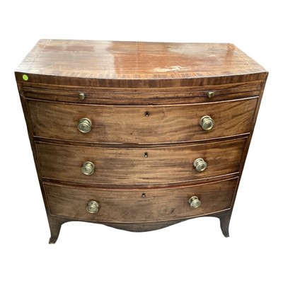 Lot 1310 - George III mahogany bow front chest of three long drawers with brushing slide, on splayed bracket feet