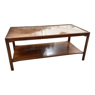 Lot 1307 - Mahogany two tier coffee table of rectangular form, with glass top