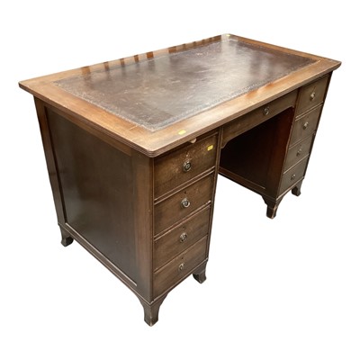 Lot 1308 - Early 20th century mahogany twin pedestal desk with an arrangement of seven drawers and leather lined top