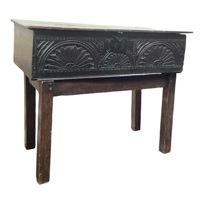 Lot 1309 - 17th century oak bible box with carved panel front, on later stand