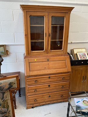Lot 5332 - Pine bureau bookcase with glazed cupboard enclosing three shelves, above three drawers, 209cm high x 100.5cm wide x 50cm deep