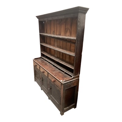 Lot 1303 - 18th century oak two height dresser with an arrangement of drawers and cupboards