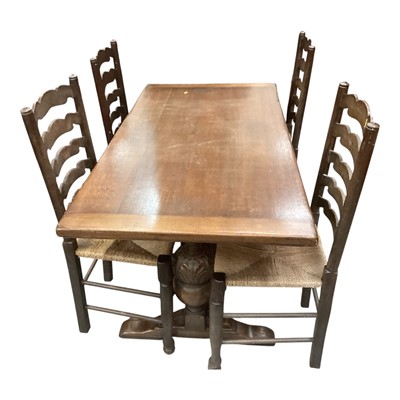 Lot 1300 - Antique-style oak refectory table on carved and bulbous supports, together with a set of six ladder back chairs and a similar elbow chair