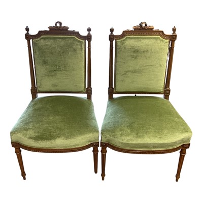 Lot 1449 - Pair of late 19th century mahogany framed chairs with carved frames and green velvet upholstery