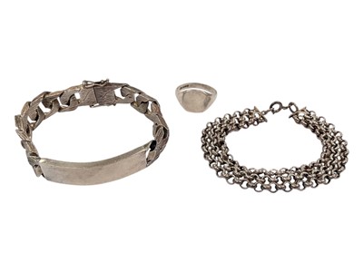 Lot 902 - Silver identity bracelet, one other silver bracelet and a silver signet ring (3)