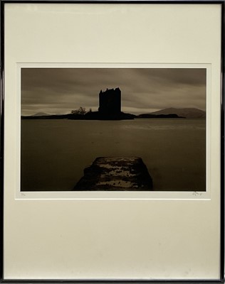 Lot 194 - Signed limited edition photographic print depicting Castle Stalker, Scotland, 1/12, 31cm x 44.5cm, in glazed frame