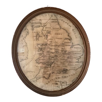 Lot 390 - Regency silk sampler map of England and Wales, including the Channel Islands, in a glazed gilt frame, the map 43 x 36cm