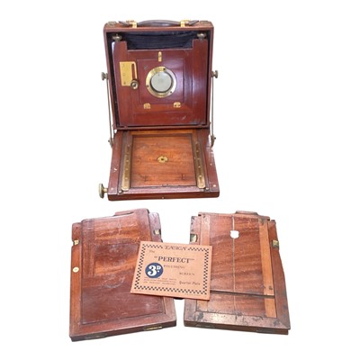 Lot 122 - Antique mahogany and brass plate camera, together with extra plates