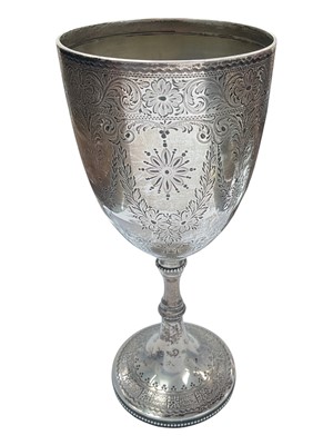 Lot 920 - Victorian silver trophy cup / chalice with engraved floral swag decoration (London 1883), 17cm high