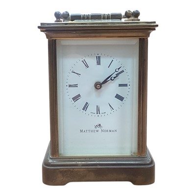 Lot 131 - Matthew Norman brass carriage clock with key