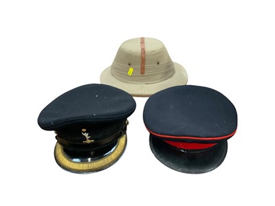 Lot 464 - 1930s pith hat, four military caps, and other militaria